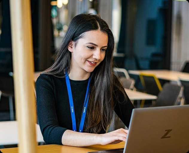 Two colleagues working together at a desk